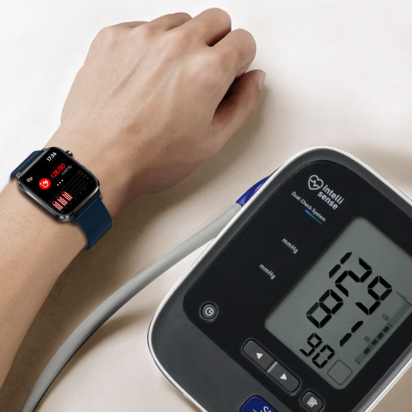 Cold Laser Therapy Watch blood pressure check next to a blood pressure monitor – VitalityWatch